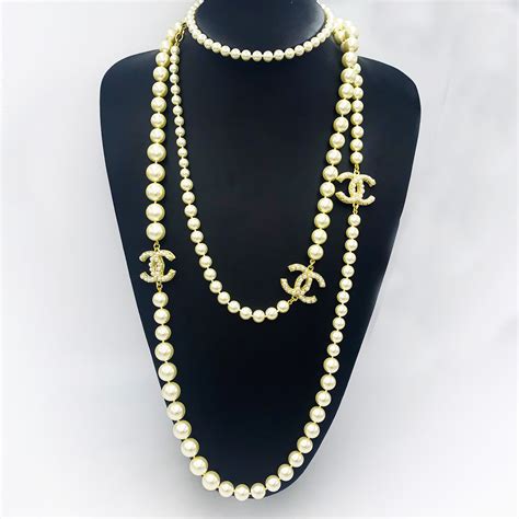 chanel classic black pearl necklace|cost of chanel pearl necklace.